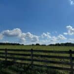 Fence in foreground along Hickory Bottom Farm, Hanover, Virginia