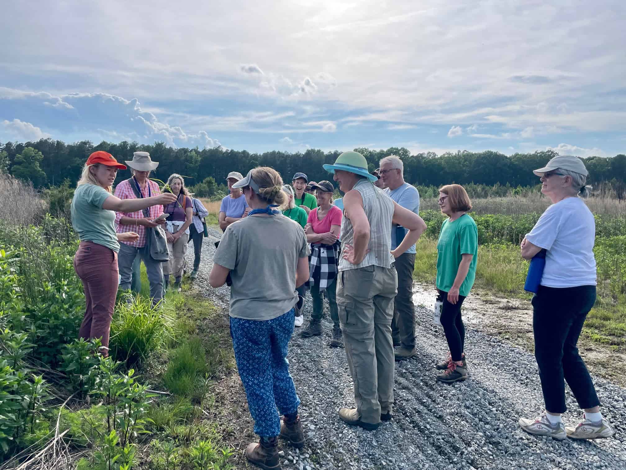 CRLC Land Stewardship Manager speaks to hikers at the Varina LandLab Conservation Area
