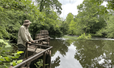 Mr. Joshua Greenwood touring the 19th century canal headgate. Photo by CRLC
