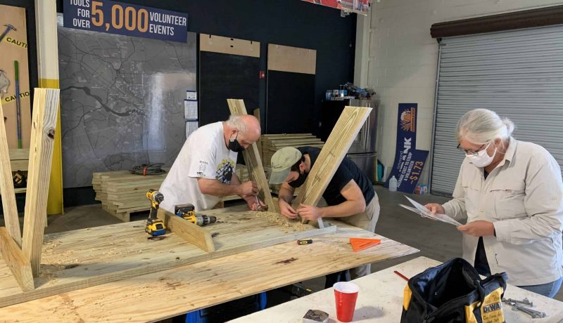 Volunteers build picnic tables for guests at CRLC's public lands.